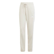 Essentials Pantaloni con risvolto in french terry a 3 strisce - Beige / Bianco